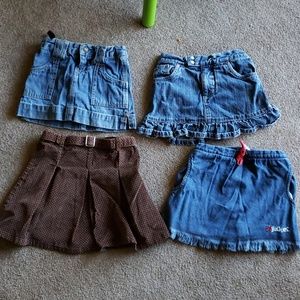 Lot of 4 size 4  skirts